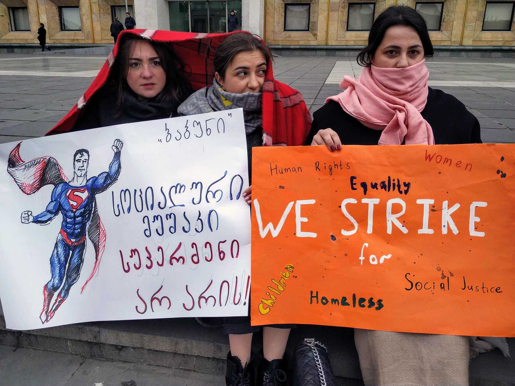 Social workers protesting outside the Government Chancellery in March 2019. The poster to the left reads: ‘social workers are not superman!’ Photo: Shota Kincha/OC Media.