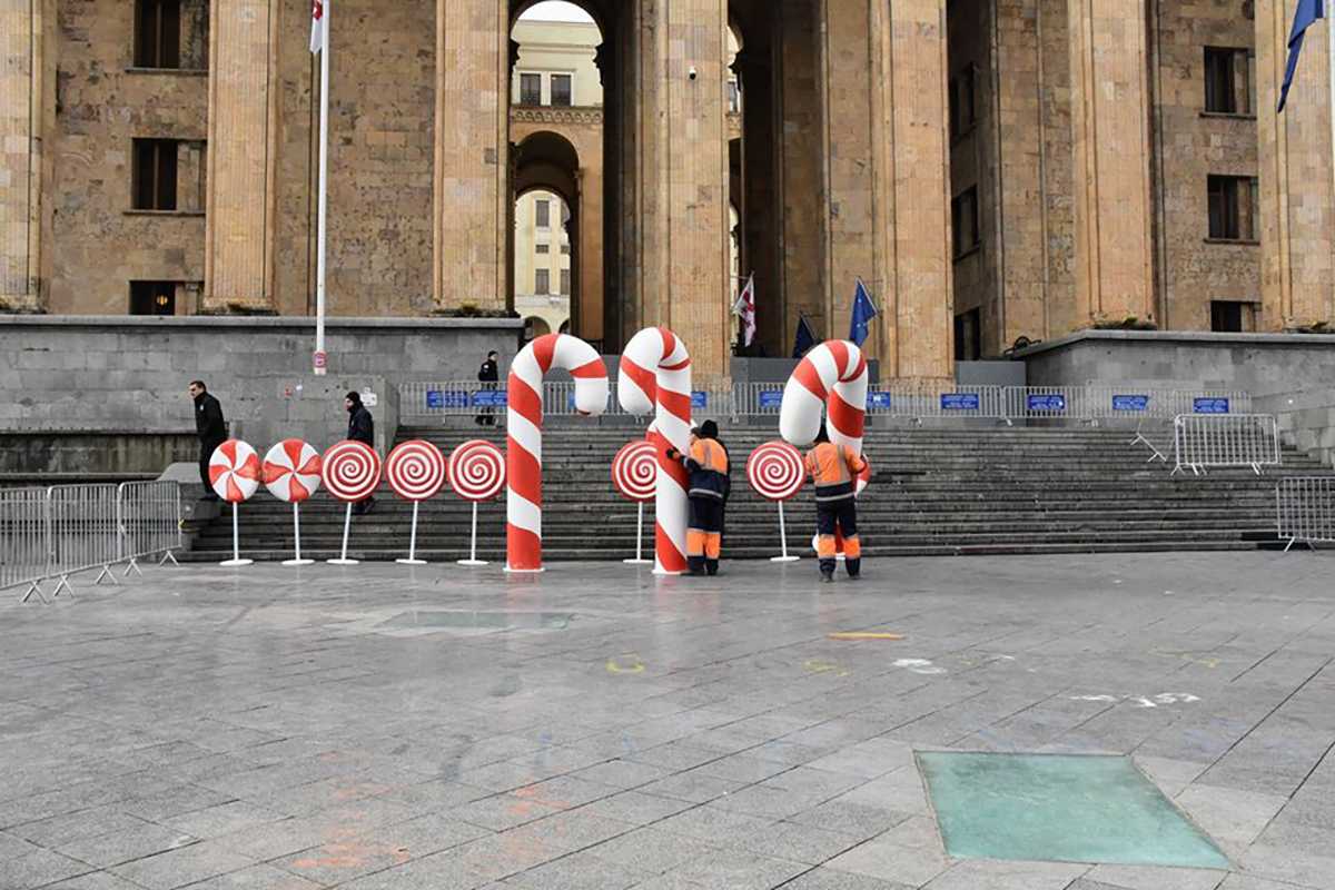 Municipal workers cleared away the protest camp early Tuesday morning and erected a New Year display in it's place. Photo: Shota Kincha/OC Media.