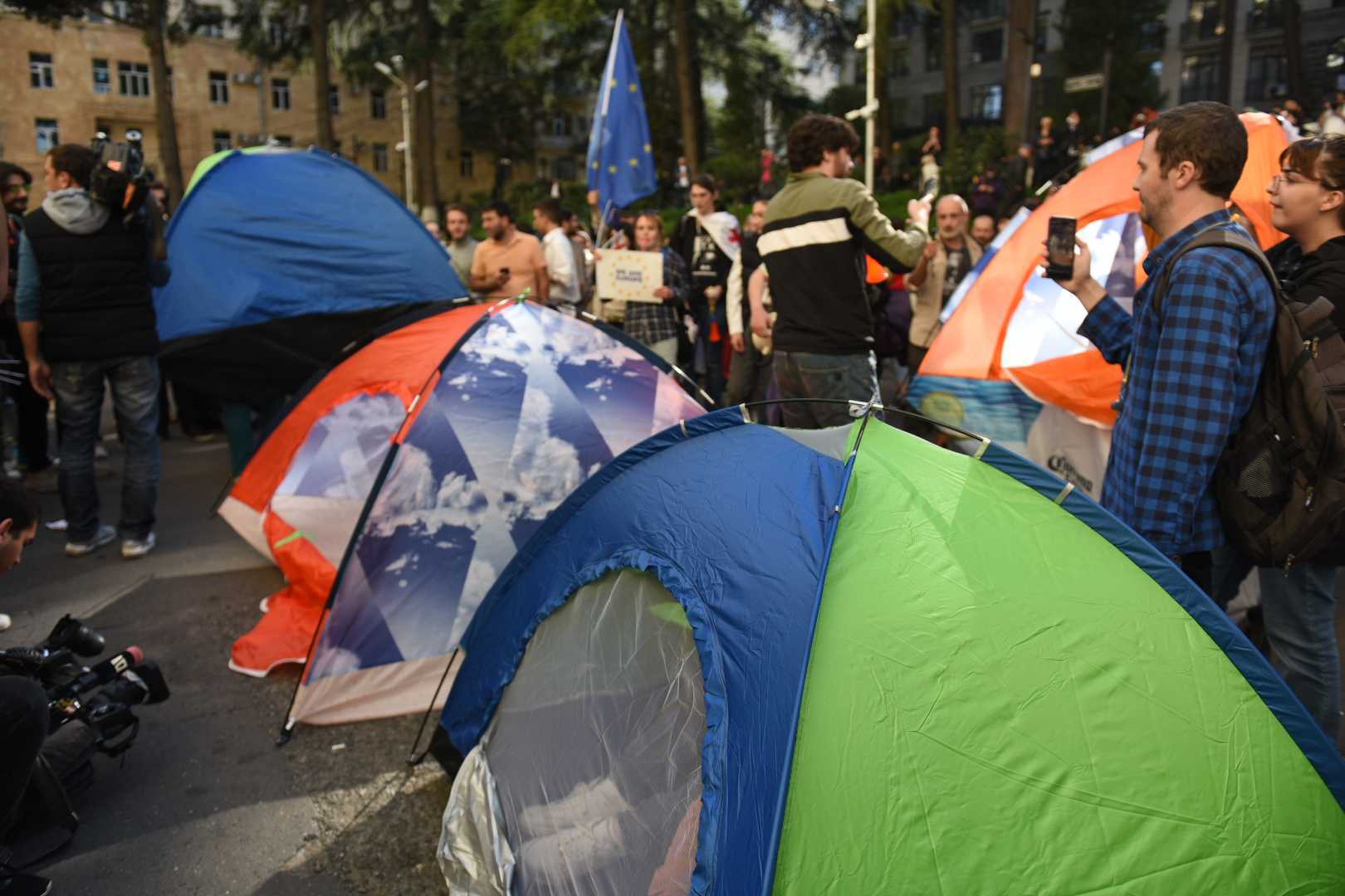 Protesters in a tent outside parliament. 5 October 2023. Image: Mariam Nikuradze/OC Media