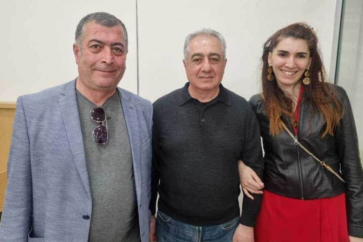 Gubad Ibadoghlu (centre) with two of his lawyers, Bahruz Bayramov and Zibeyda Sadigova upon his release. 
