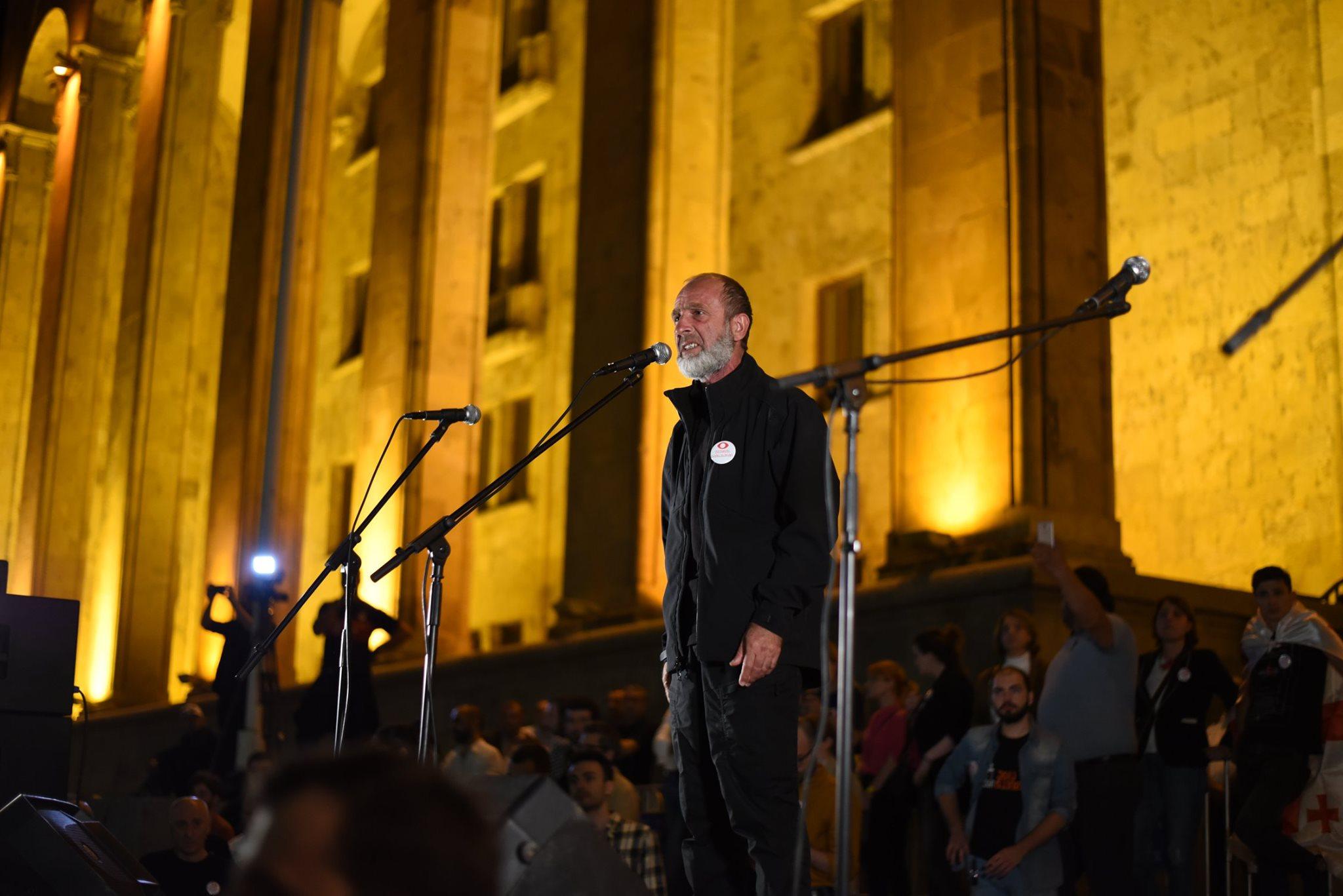 Temirlan’s father, Malkhaz Machalikashvili, addressing people during a protest outside the Georgian Dream offices in Tbilisi. Photo: Mariam Nikuradze/OC Media.