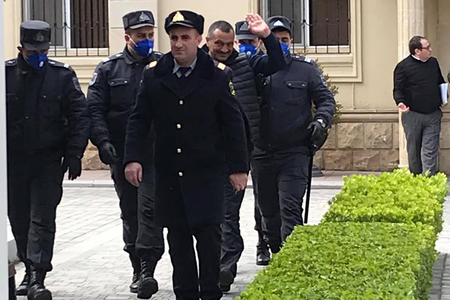 Tofig Yagublu in front of the Nizami District Court after his initial arrest. Photo: Nigar Hazi/Facebook.